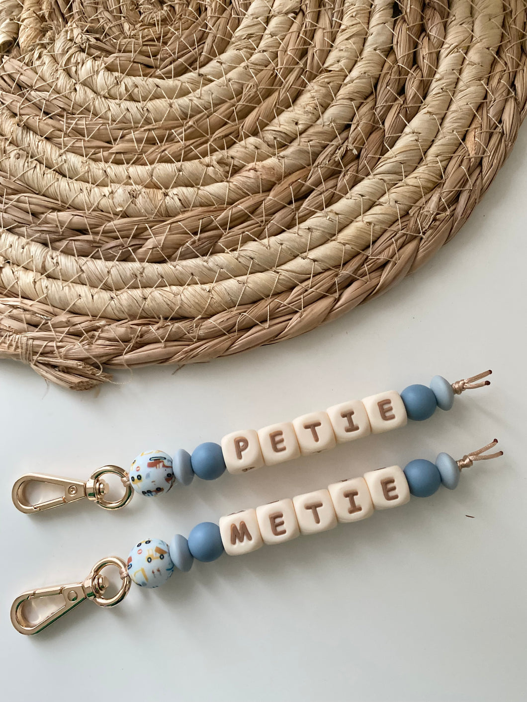 Sleutelhanger blauw tintjes en werk voertuigen