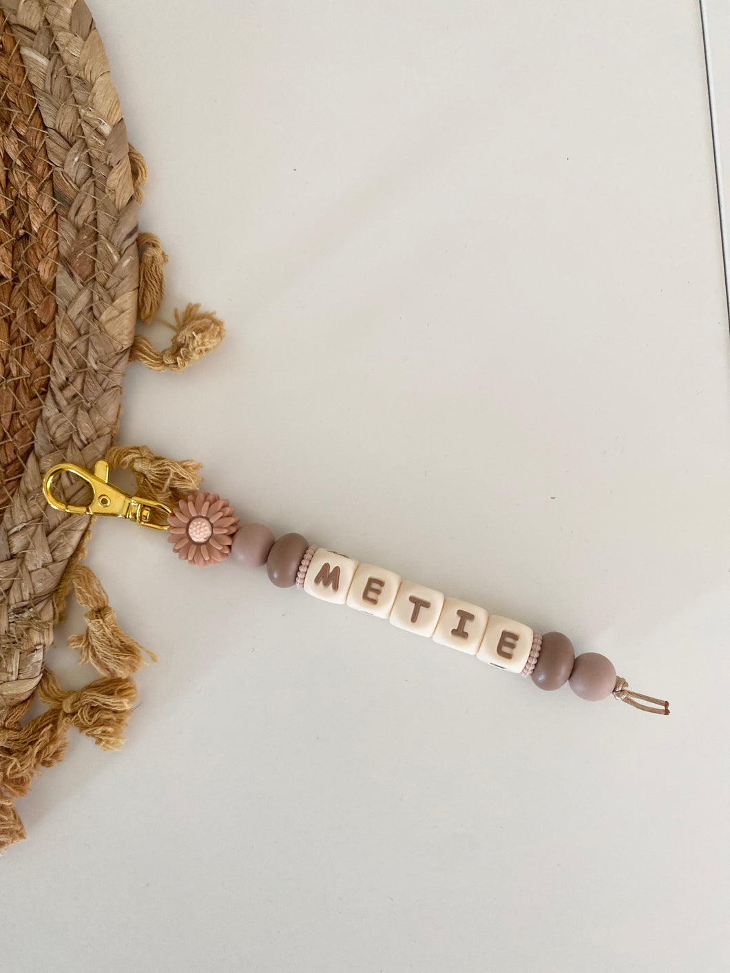 Nude DAISY bloemen kraal met beige/bruine tinten